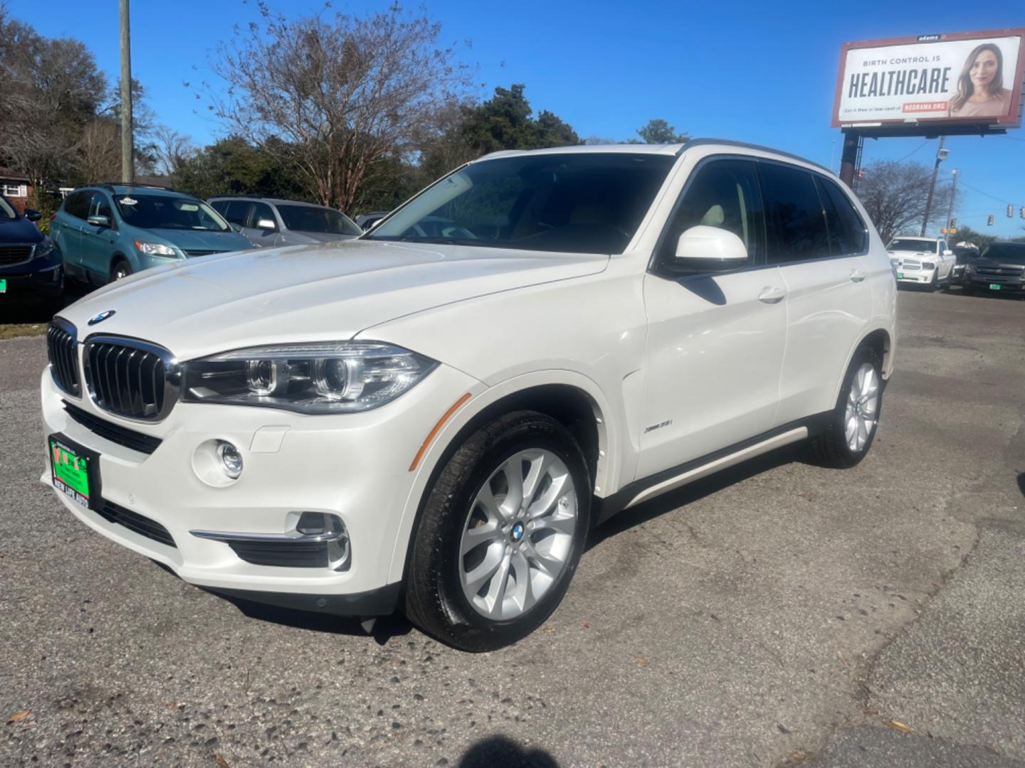 2014 WHITE BMW X5 XDRIVE35I (5UXKR0C54E0) with an 3.0L engine, Automatic transmission, located at 5103 Dorchester Rd., Charleston, SC, 29418-5607, (843) 767-1122, 36.245171, -115.228050 - Photo#2